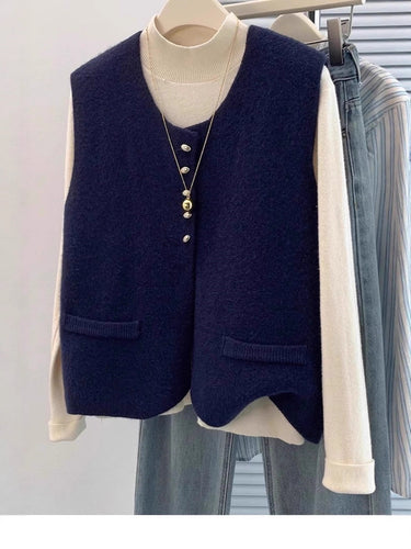 Damen Kurzgeschnittene Ärmellose Strickweste mit Perlenknopfleiste und aufgesetzten Taschen Shop Nory