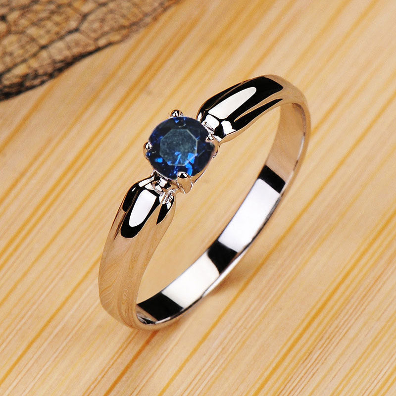 Damen Verlobungsring mit funkelndem Zirkonia und geschwungenem Band Shop Nory