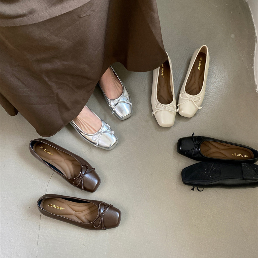 Damen klassisch geschnittene Ballerinas mit zierlichem Schleifenakzent und komfortabler Fußbettung