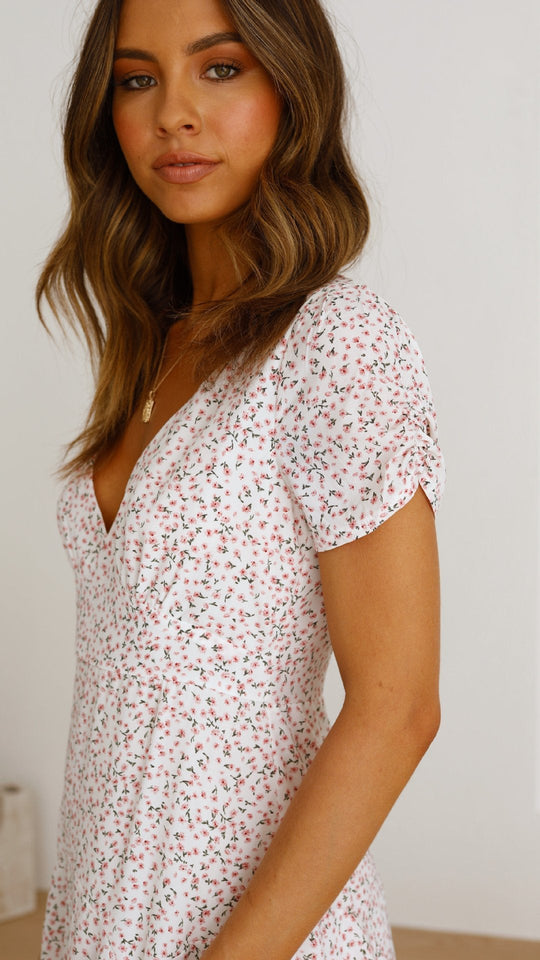 Damen Baumwollkleid mit V-Ausschnitt und Puffärmeln Shopnory