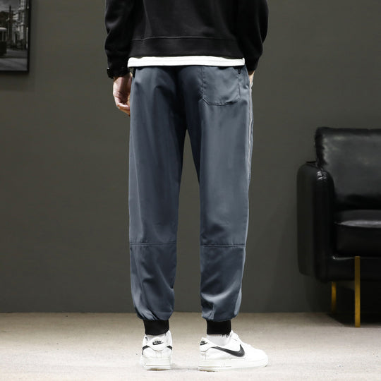 Herren Sportive Jogginghose im Trackstyle mit seitlichen Kontraststreifen, Tunnelzug und elastischen Bündchen Shop Nory