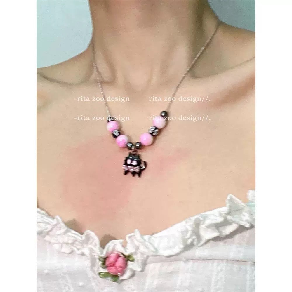 Damen Halskette mit verspieltem Katzenanhänger und bunten Perlendetails Shop Nory