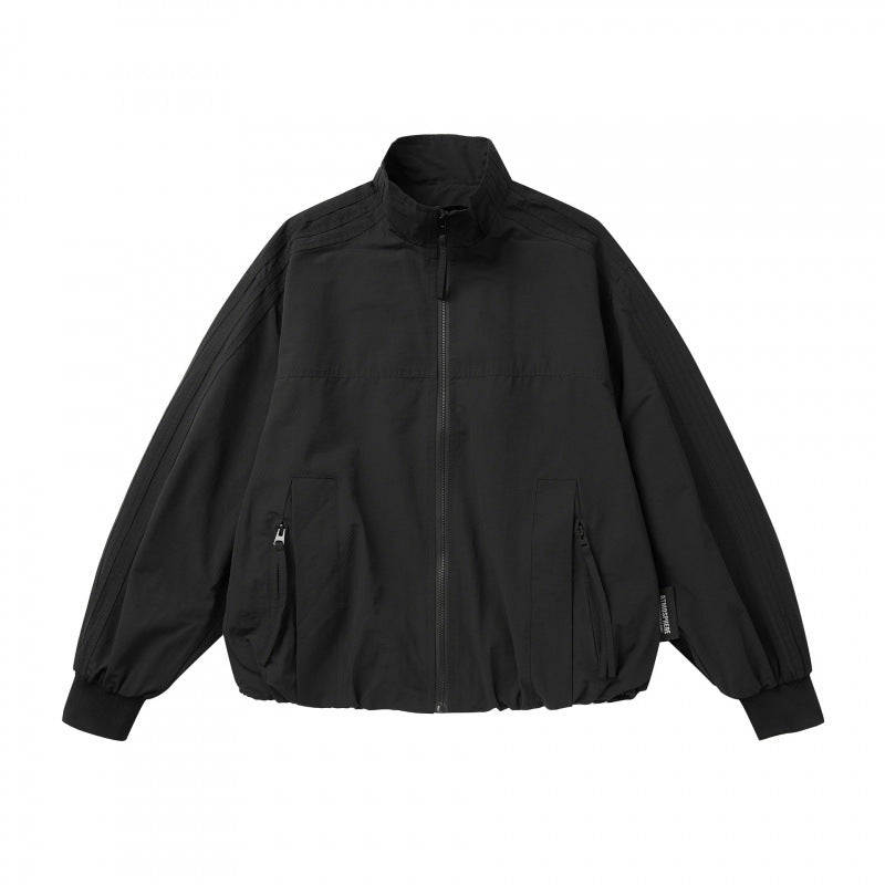 Unisex Leichte Boxy-Outdoorjacke im Trackstil mit hohem Stehkragen, Reißverschlusstaschen und elastischem Saum Shop Nory
