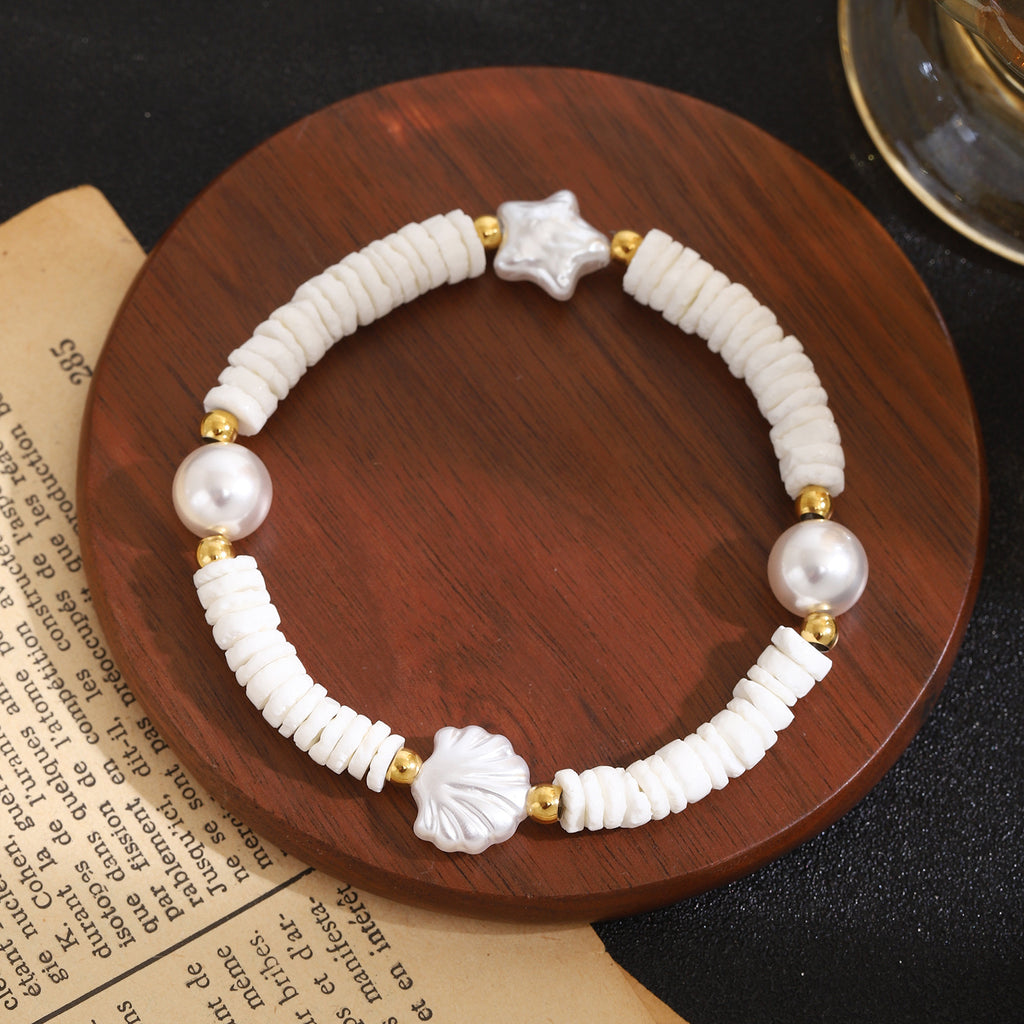 Damen Perlenarmband mit klassischem Muscheldesign Shop Nory