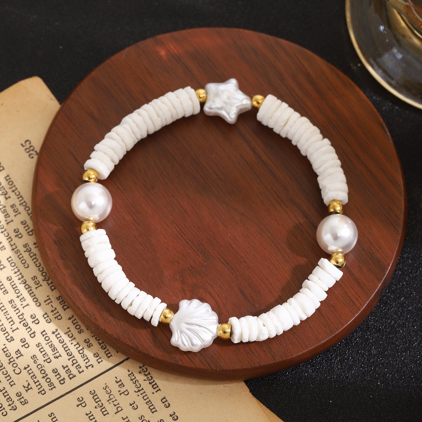 Damen Perlenarmband mit klassischem Muscheldesign Shop Nory
