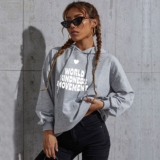 Damen Lässiger Oversize-Kapuzenpullover mit Statement-Print, Kängurutasche und Rippbündchen Shop Nory