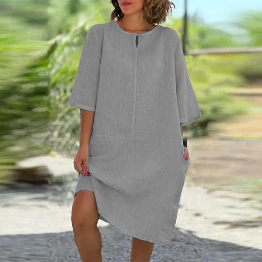Damen luftig geschnittenes Kleid mit praktischen Taschen und elegantem Ausschnitt