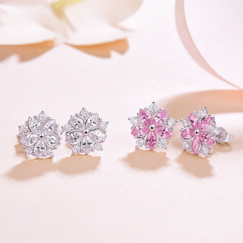 Damen Ohrringe im floralen Design mit funkelnden Zirkonia Shop Nory