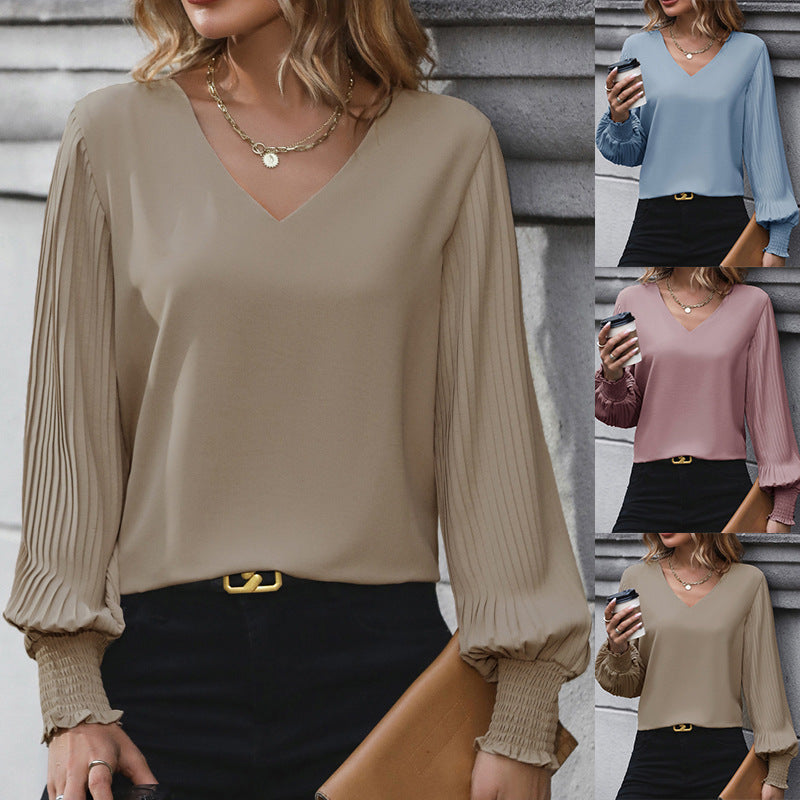 Damen Feminine V-Ausschnitt-Bluse mit plissierten Ballonärmeln und Smokmanschetten Shop Nory