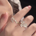 Damen filigraner Blumenring mit funkelnden Zirkonia-Akzenten Shop Nory
