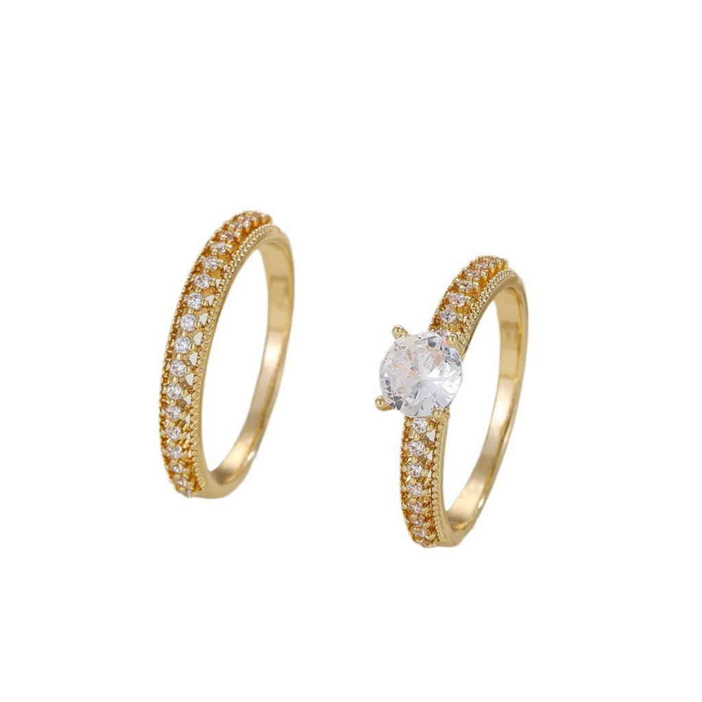 Damenring aus edlem goldfarbenem Metall mit funkelnden Kristallen Shop Nory