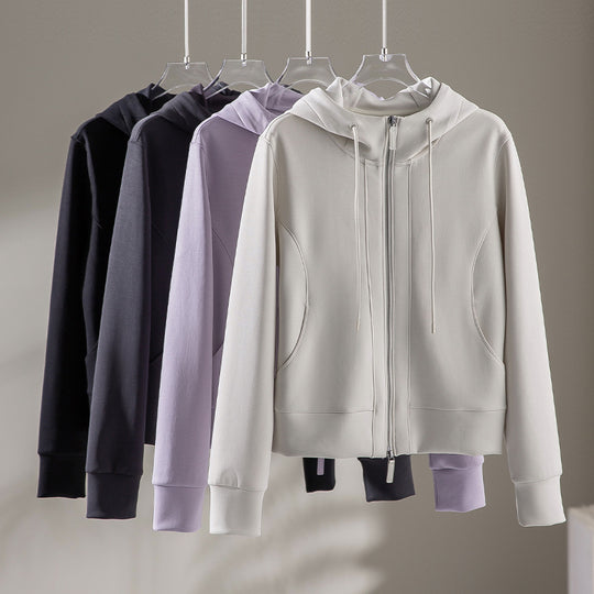 Damen Kapuzen-Performance-Zipjacke mit Reißverschluss und seitlichen Eingriffstaschen Shop Nory