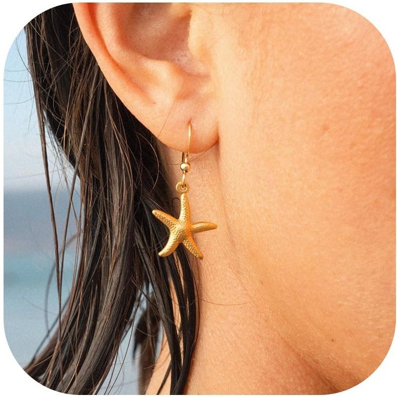 Damen Ohrhänger mit maritimen Sternen-Design und eleganter Perlenverzierung Shop Nory