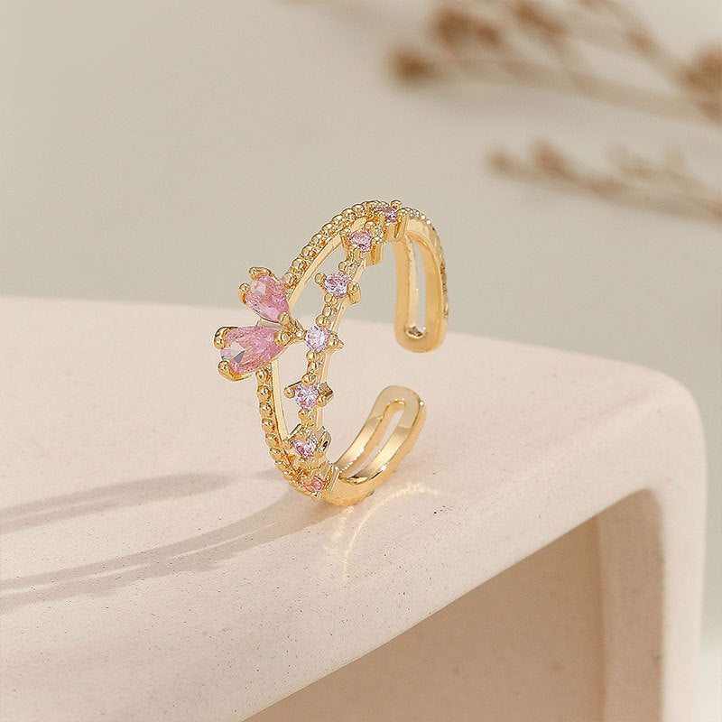 Damen Offener Ring mit schimmernden Kristallen und filigranem Design Shop Nory