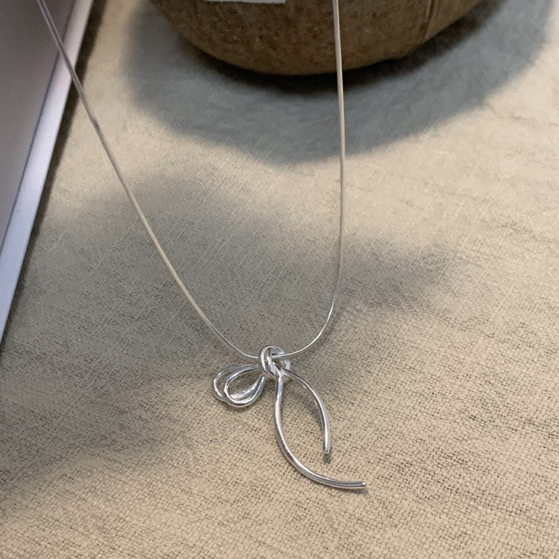 Damen Halskette mit elegantem Schleifenanhänger Shop Nory