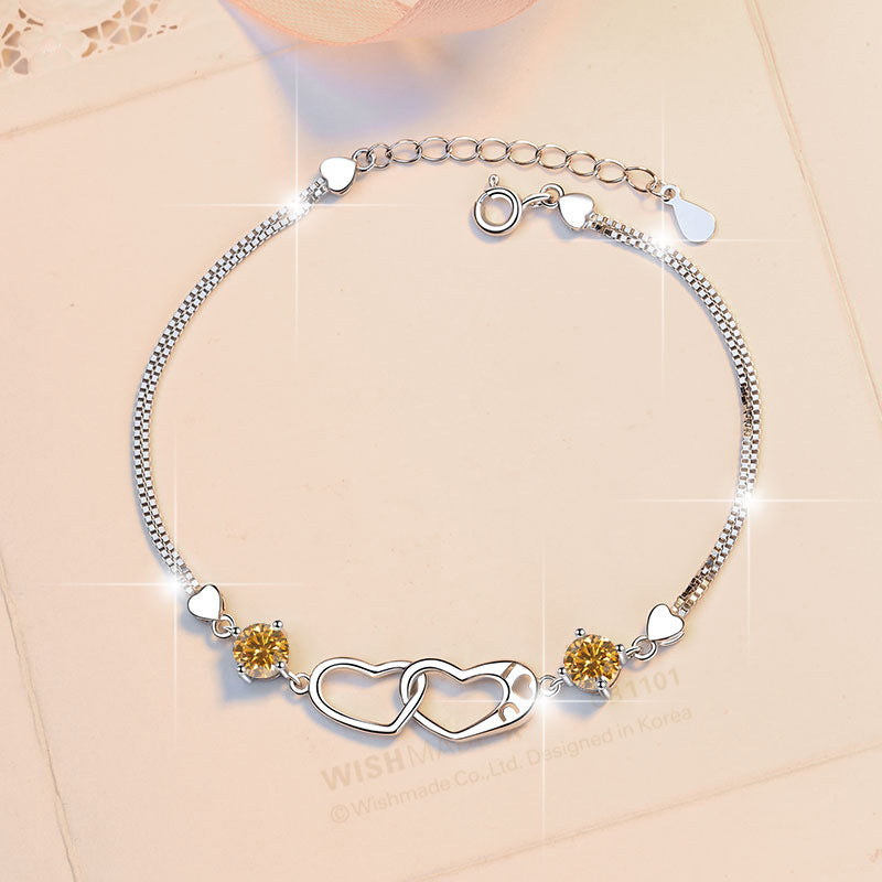 Damenarmband mit elegantem Herzdesign und funkelnden Zirkonia Shop Nory