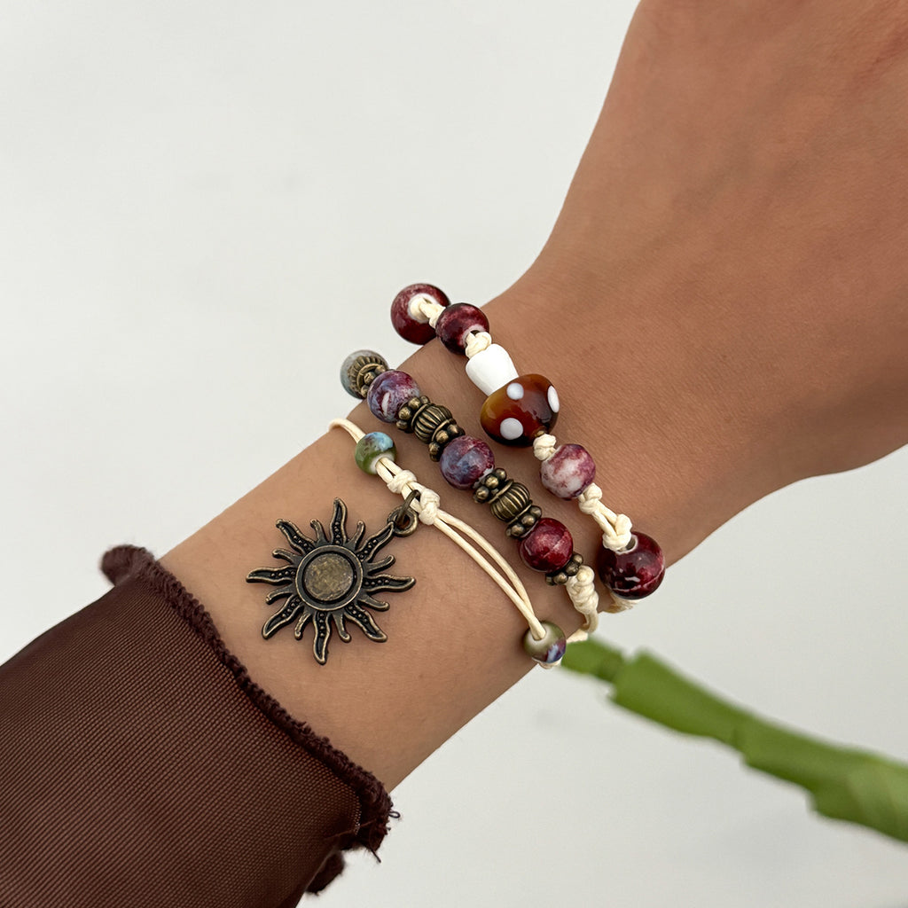 Damen Modeschmuck-Armband mit Sonne und bunten Perlen Shop Nory