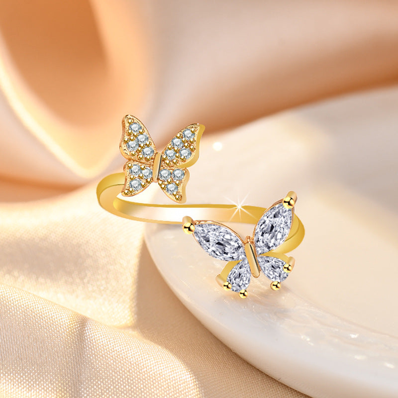 Damenring mit elegantem Schmetterlingsdesign und funkelnden Zirkonia Shop Nory
