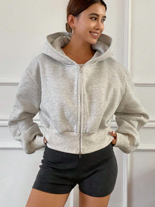 Damen Cropped Kapuzenjacke mit durchgehendem Reißverschluss und voluminösen Raglanärmeln Shop Nory