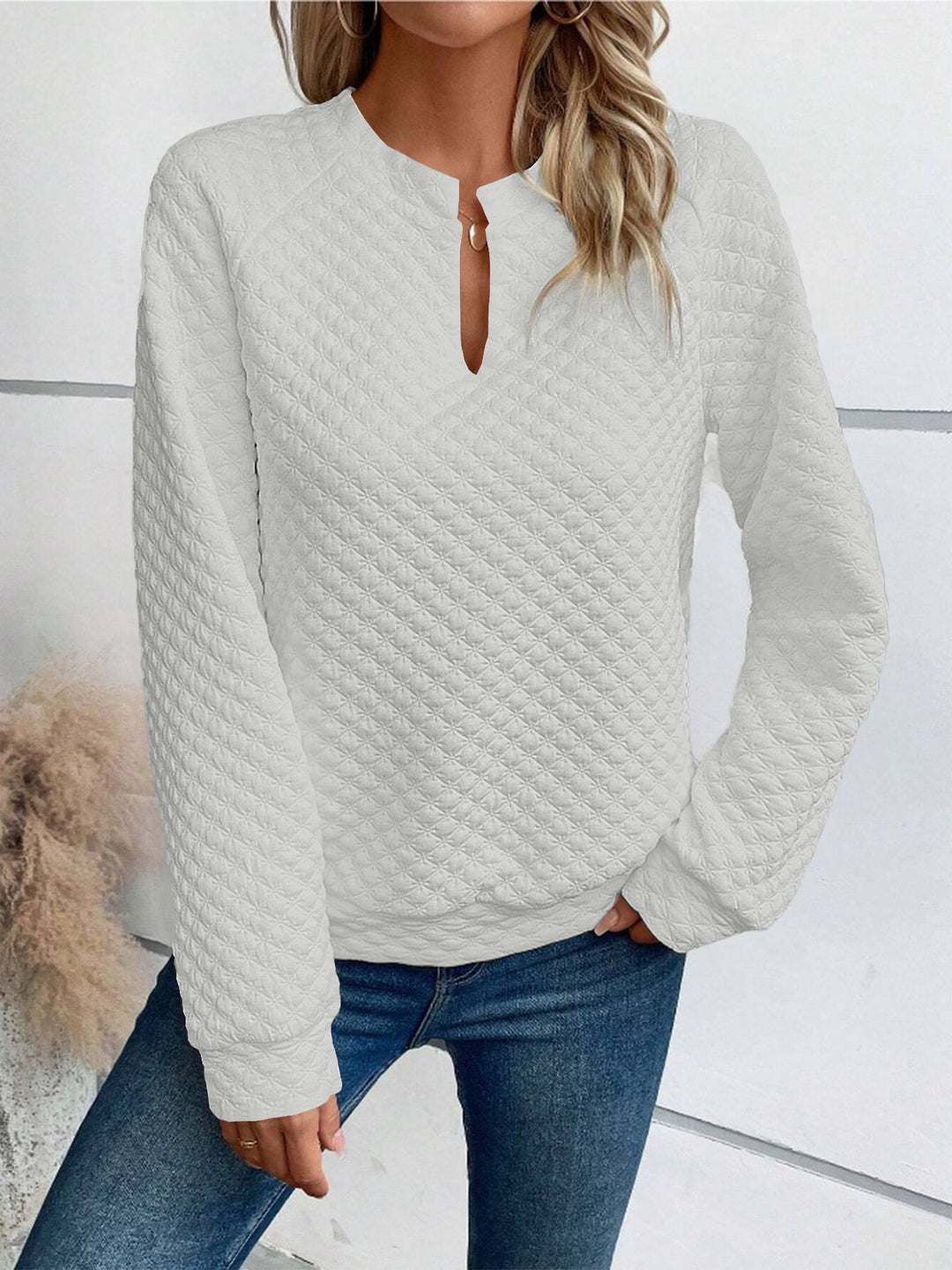 Damen Gestepptes Sweatshirt mit Schlitzkragen, Rautenstruktur und Raglanärmeln Shop Nory