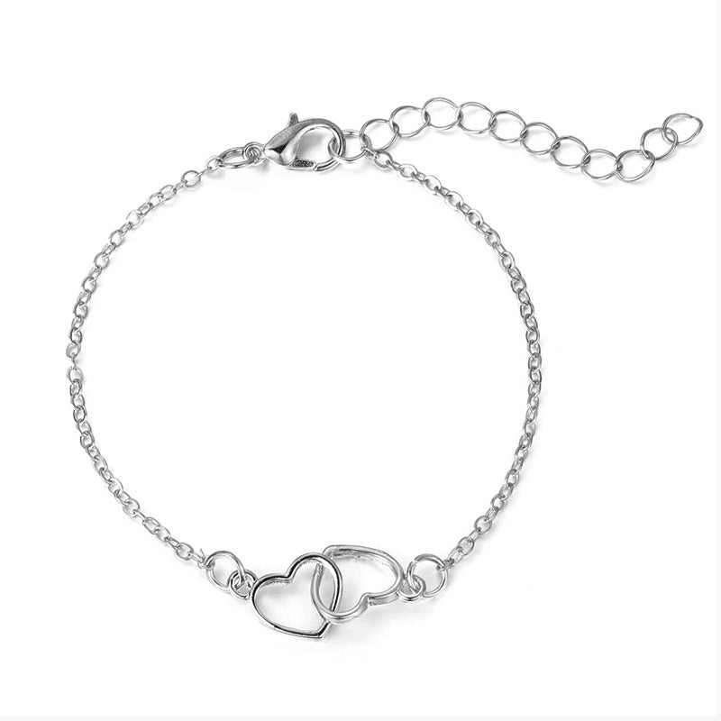 Damenarmband mit dreifachem Herzdesign Shop Nory