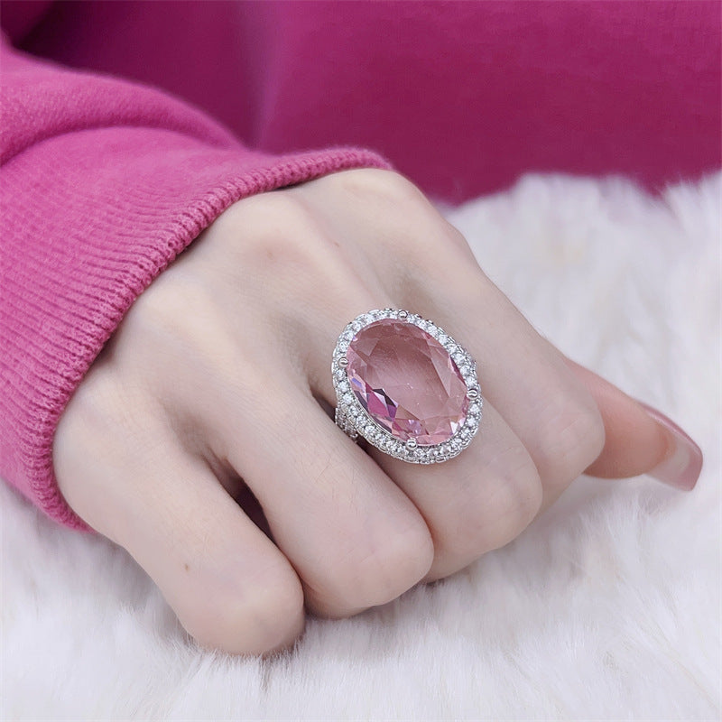 Damen eleganter Schmuckring mit ovalem Stein und funkelndem Zirkonia-Besatz Shop Nory