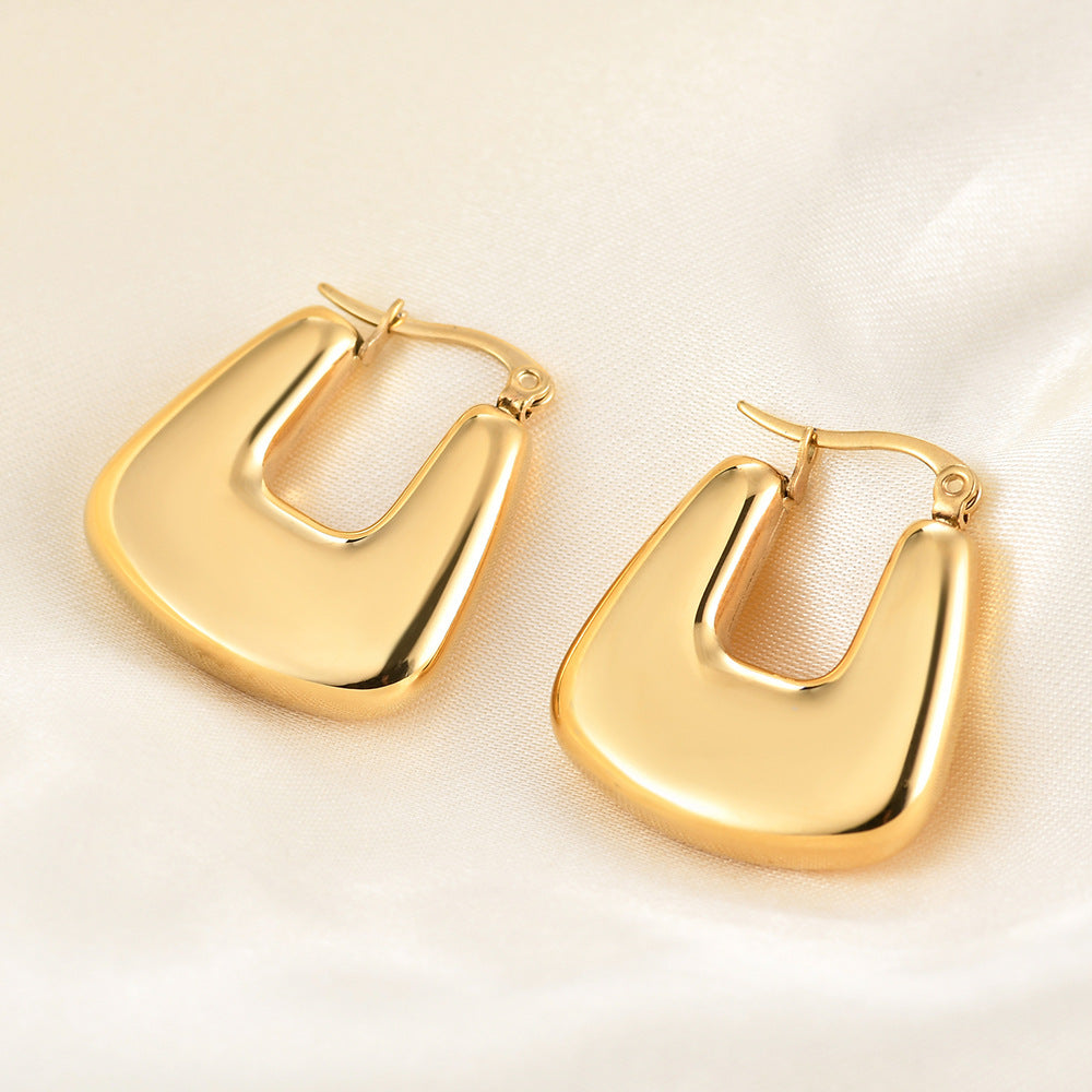 Damen Ohrringe im eleganten, geschwungenen Design Shop Nory