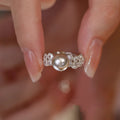 Damen eleganter Ring mit funkelnden Kristallen und Perle Shop Nory