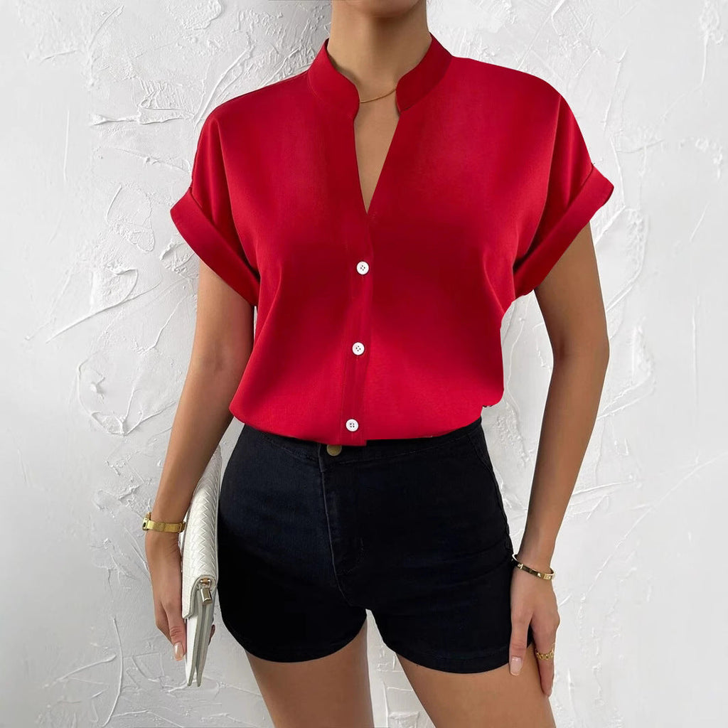 Damen Elegante Kurzarmbluse mit Stehkragen und subtilen Knopfdetails