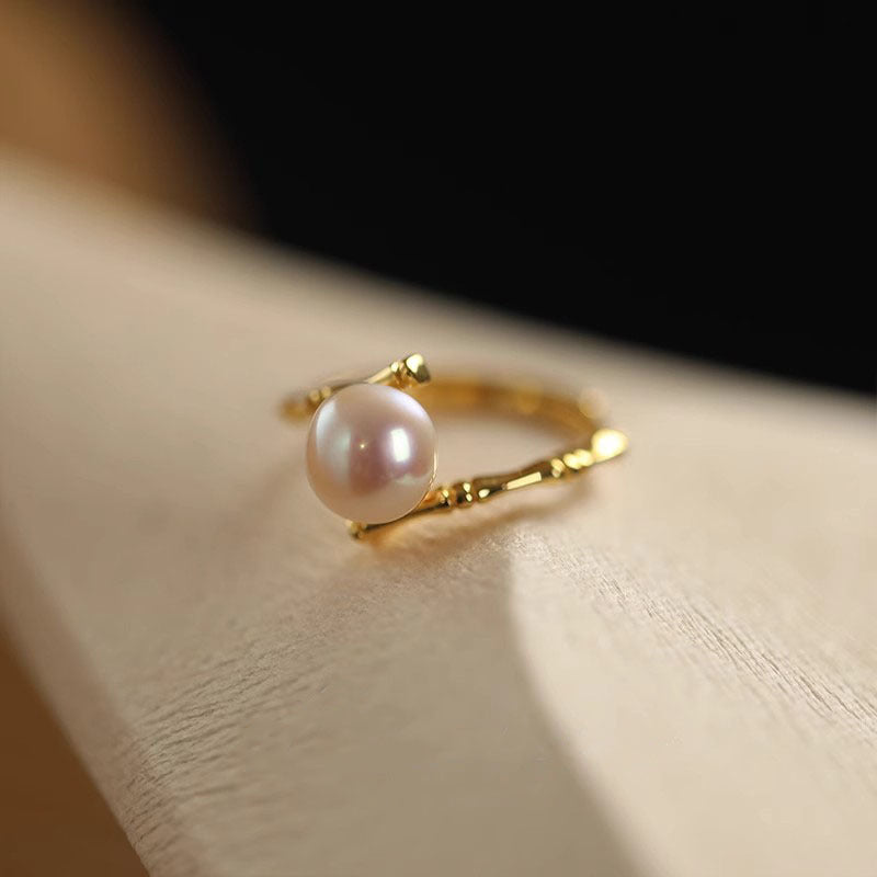 Damen Zierlicher Ring mit hochwertiger Perle und kunstvoller Fassung Shop Nory
