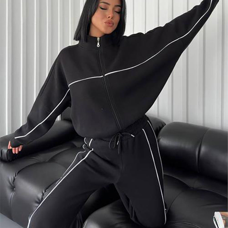 Damen lässiges Sweatset mit Stehkragen Reißverschluss gekürzter Jacke und hochtaillierter Schlaghose Shop Nory