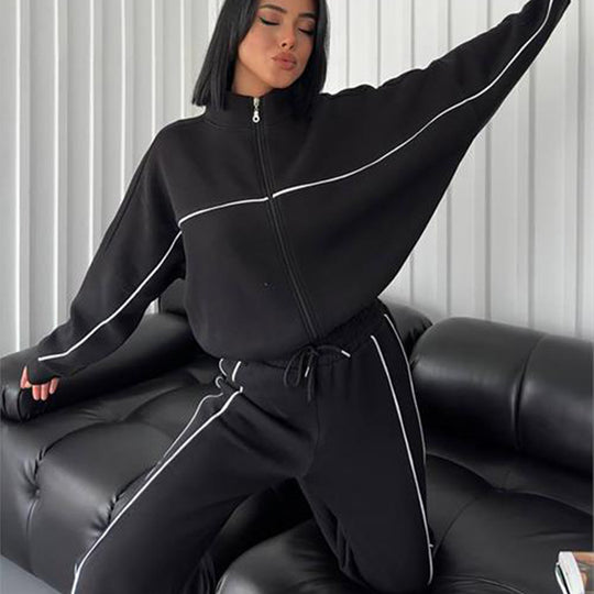 Damen lässiges Sweatset mit Stehkragen Reißverschluss gekürzter Jacke und hochtaillierter Schlaghose Shop Nory