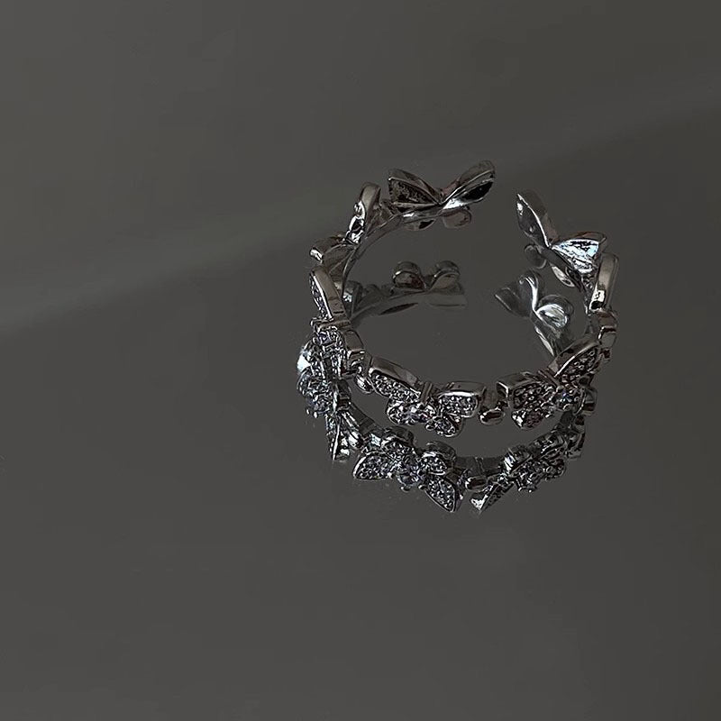Damenring mit filigranem Schmetterlingsdesign und funkelnden Zirkonia Shop Nory