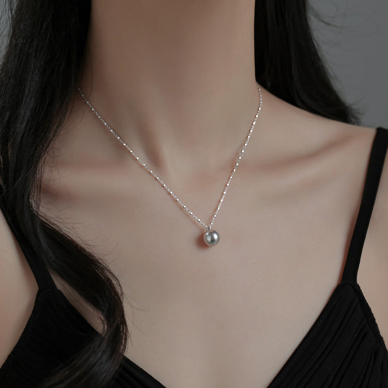 Damen elegante Halskette mit zeitlosem Perlenanhänger und feinem Kettendesign Shop Nory