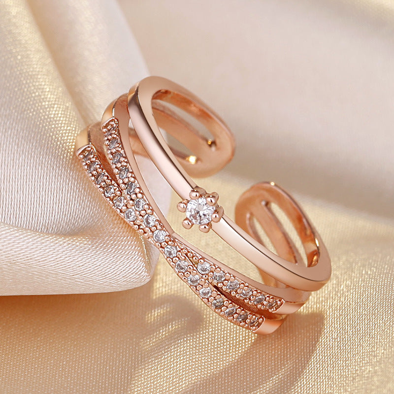 Damen Offener Ring mit funkelnden Zirkonia-Elementen und kunstvollem Design Shop Nory