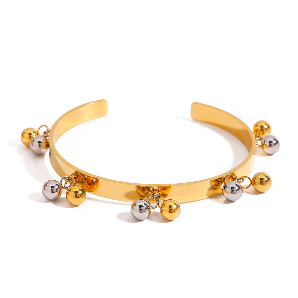 Damen Armreif mit eleganten Kugelanhängern aus hypoallergenem Edelstahl Shop Nory