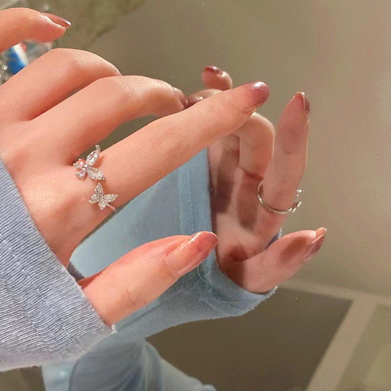 Damen Ring mit filigranem Schmetterlingsdesign und funkelnden Zirkonia Shop Nory