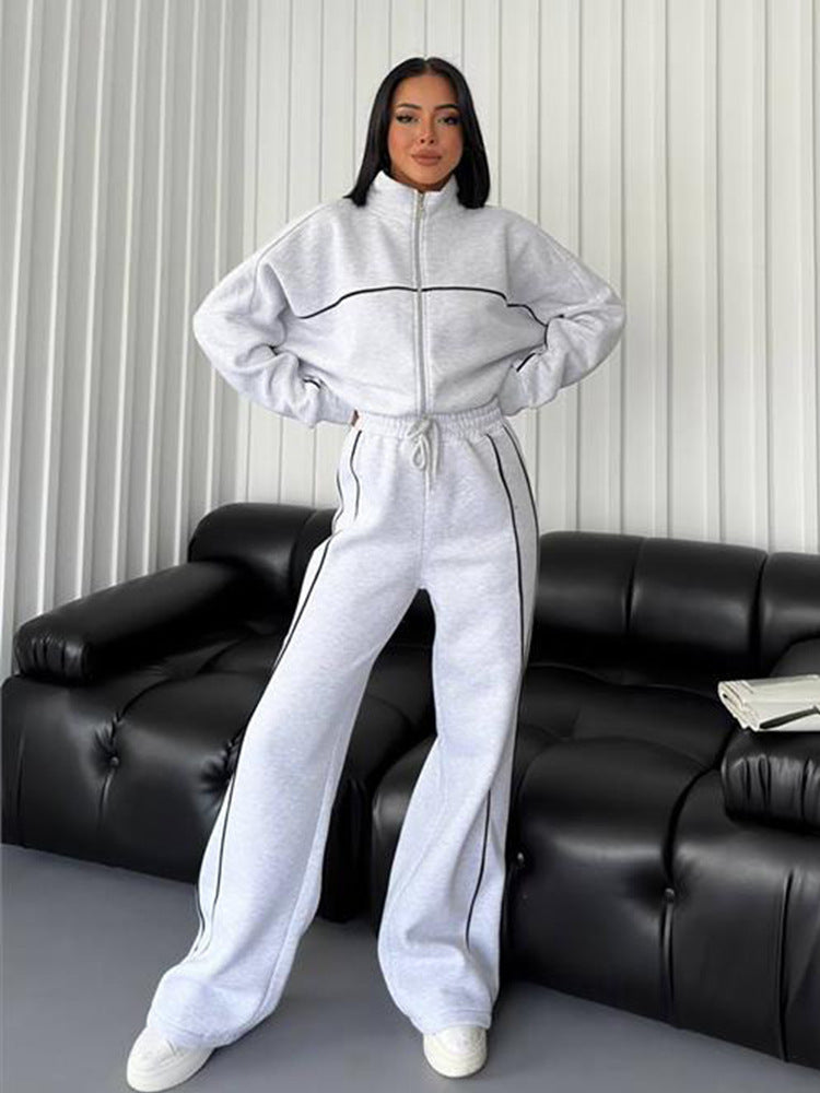 Damen lässiges Sweatset mit Stehkragen Reißverschluss gekürzter Jacke und hochtaillierter Schlaghose Shop Nory