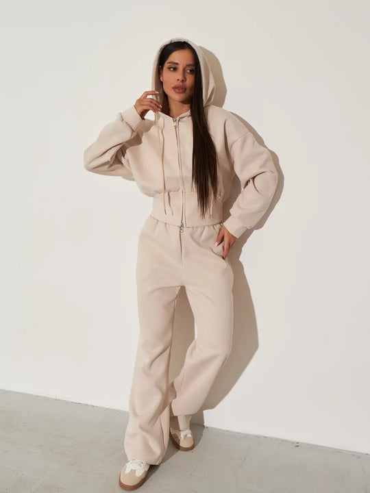 Damen kurzes Kapuzen-Zipshirt mit tailliertem Tunnelzug und weit geschnittene High-Waist-Loungehose Shop Nory