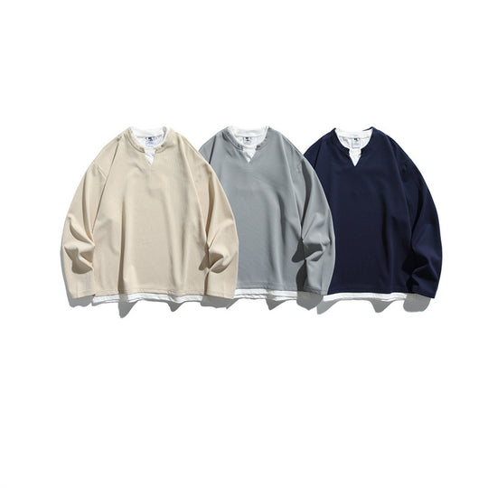 Unisex Oversize-Sweatshirt mit V‑Notch und integriertem Layer‑Look Shop Nory