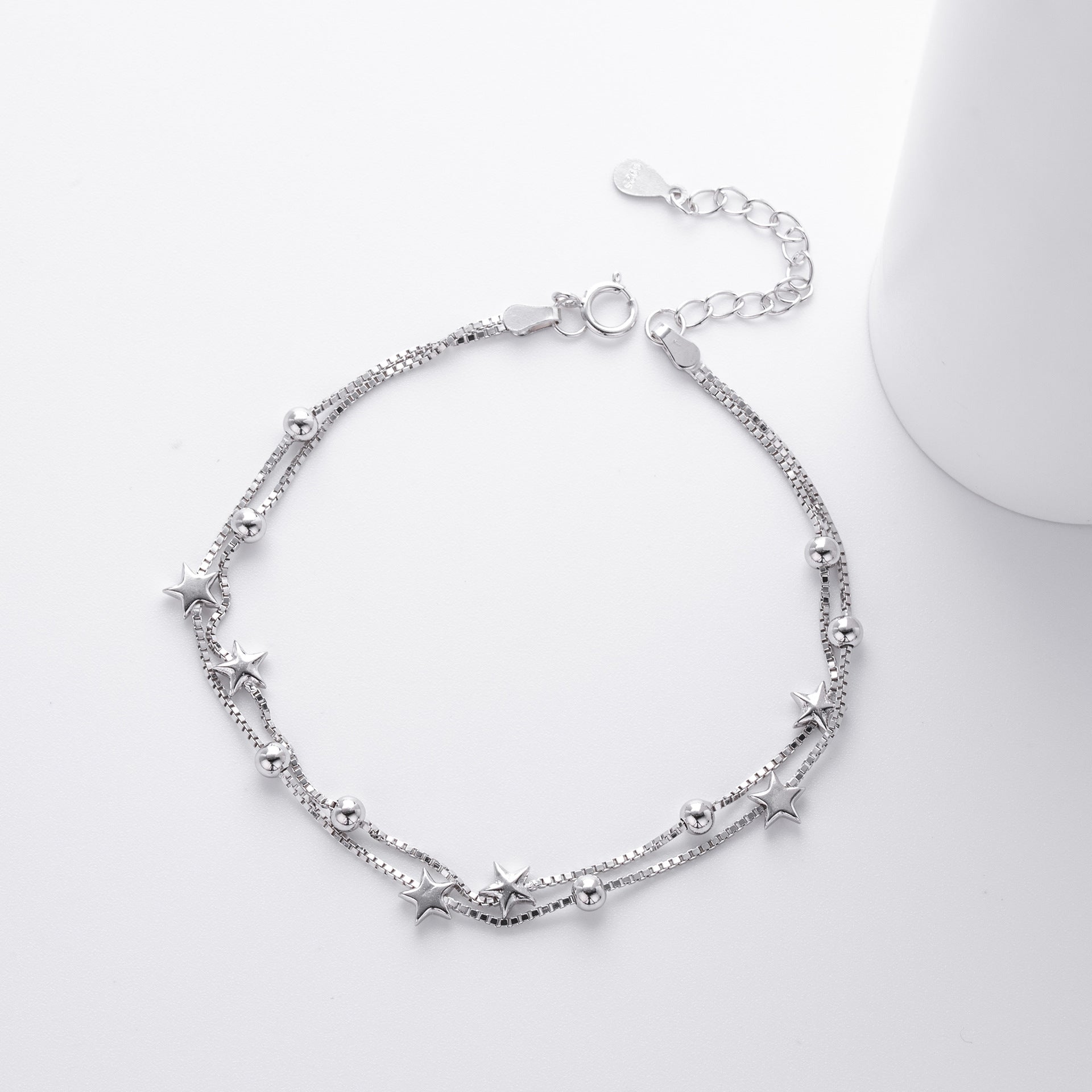 Damen Sterlingsilber Armbänder mit funkelnden Sternen und eleganten Kugeldetails Shop Nory