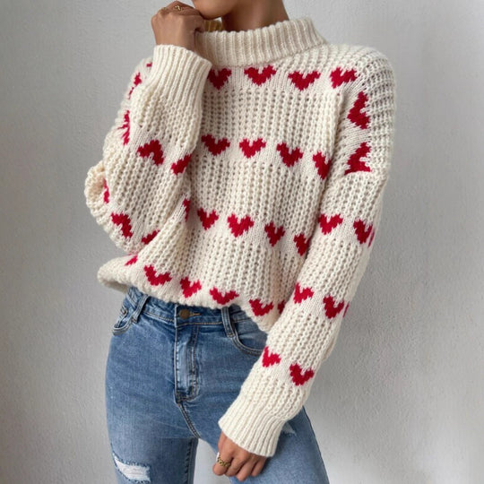 Damen nan Grobstrickpullover mit eingestrickten Herzmotiven, hohem Stehkragen und lässiger Oversize-Silhouette Shop Nory