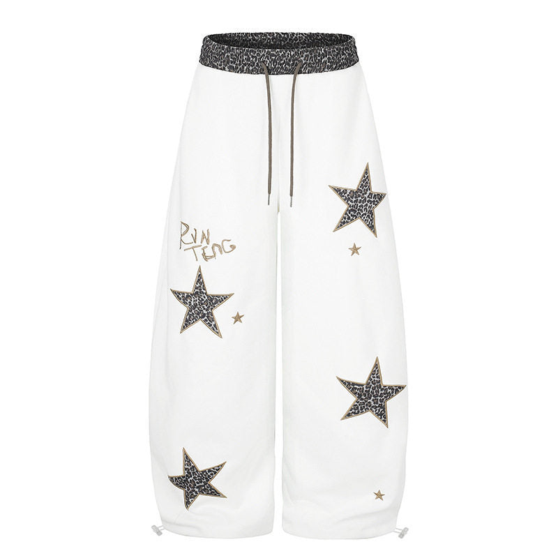 Damen Extraweite Palazzo‑Sweathose mit Leo‑Taille, Stern‑Applikationen und Kordelzug Shop Nory