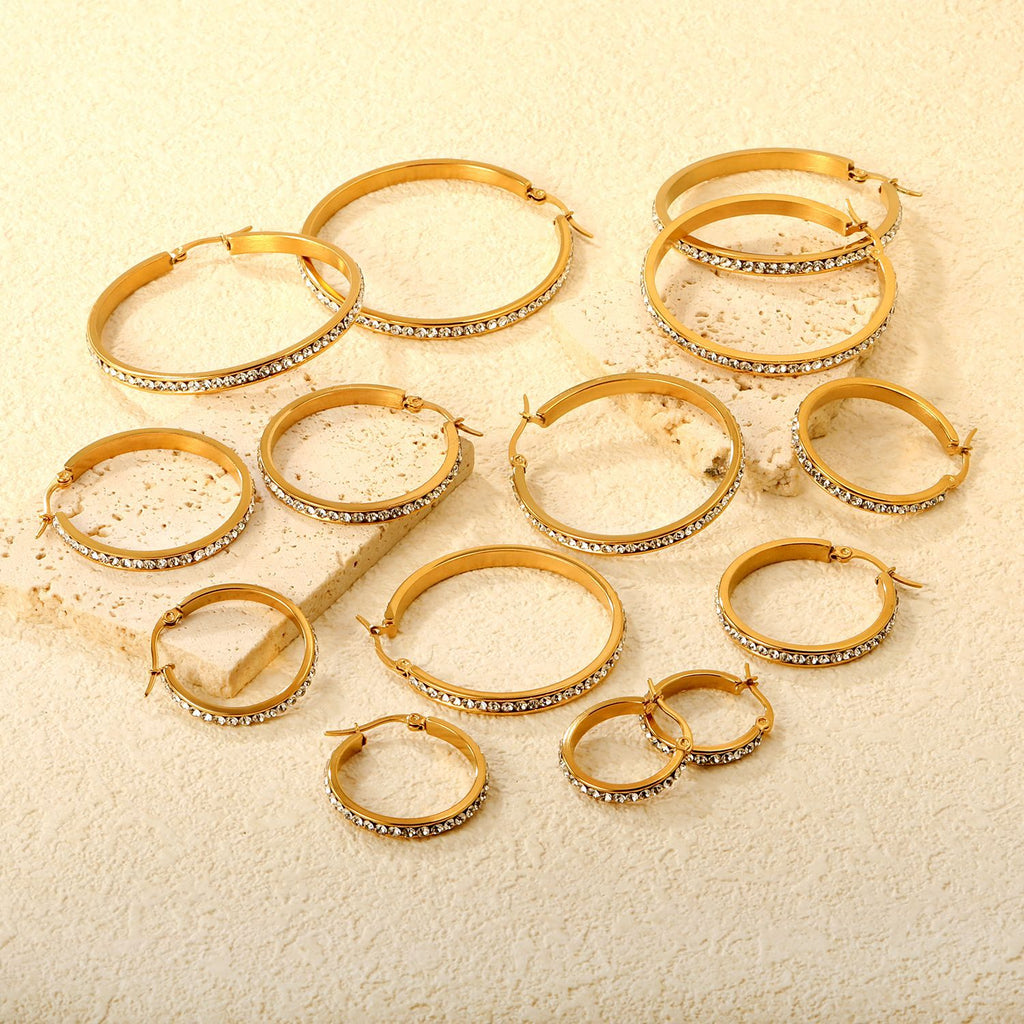 Damen Creolen mit funkelnden Kristallen und hochwertiger Goldbeschichtung Shop Nory