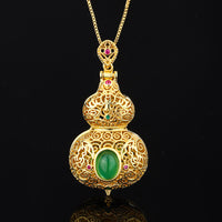 Goldene Flasche mit Kette