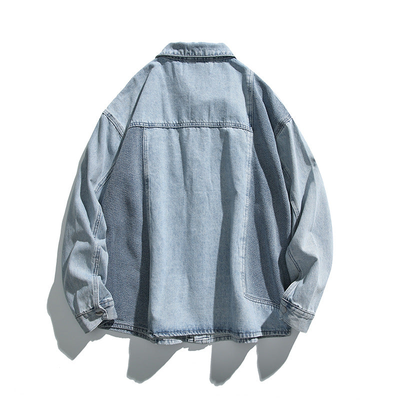 Unisex Oversize-Jeansjacke mit kontrastreichen Webpaneelen und Druckknopfverschluss Shop Nory