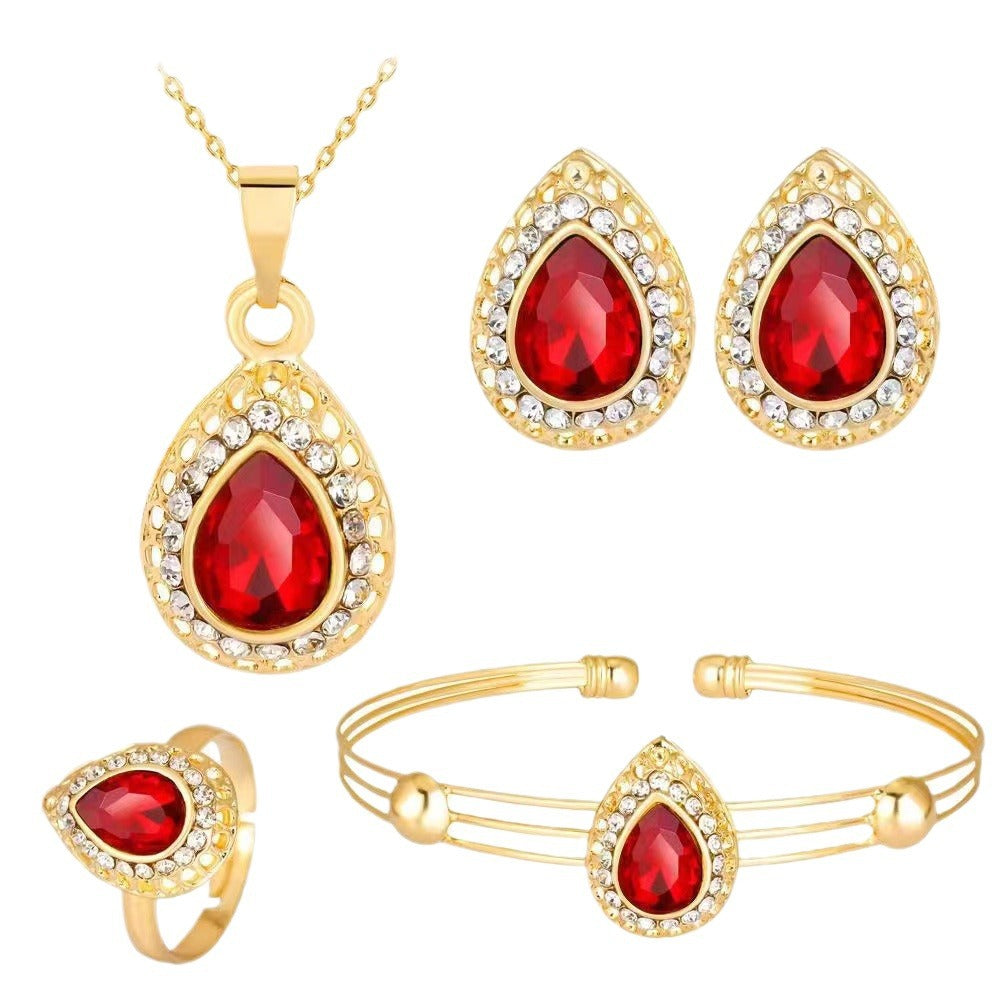 Tropfenförmiges Kristall-Schmuckset mit vergoldeter Halskette, Armband, Ring und Ohrsteckern