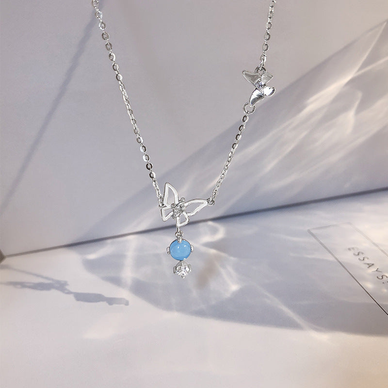 Damen Halskette mit kunstvollem Schmetterlingsdesign und funkelndem Edelstein Shop Nory