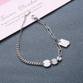 Damen Armband mit modernem Anhänger und künstlerischen Designelementen Shop Nory