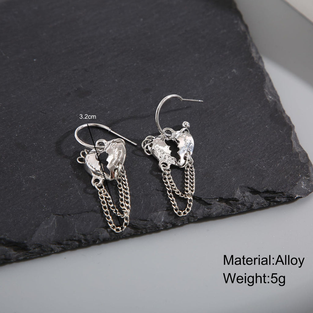 Damen Ohrringe mit funkelnden herzförmigen Anhängern und eleganten Kettendetails Shop Nory
